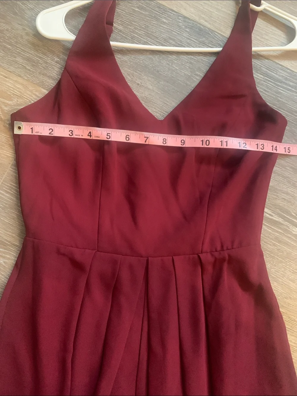 Adelyn Rae Burgundy Sleeveless V-Neck Maxi Dress with an opening between the leg